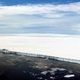 A mind-blowing shot of A-68, revealing the extent of its size. The iceberg is about 630 feet thick, of which 100 feet rests above the surface. (Image: NASA/John Sonntag)